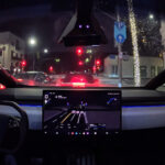 Tesla Cybertruck self-driving using FSD (Supervised) as on-screen visualizations render the environment in 3D space.
