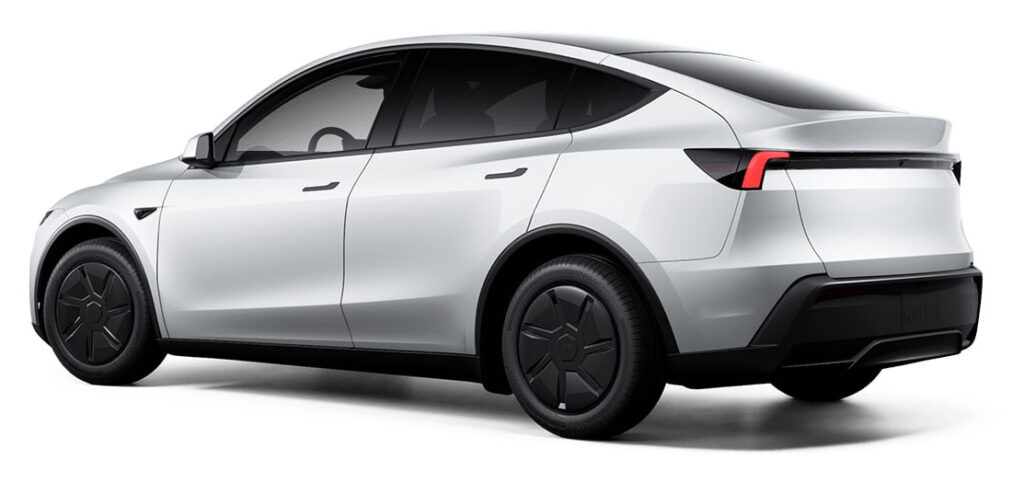 Rear-end of the new Tesla Model Y Standard in Pearl White Multi-Coat paint.