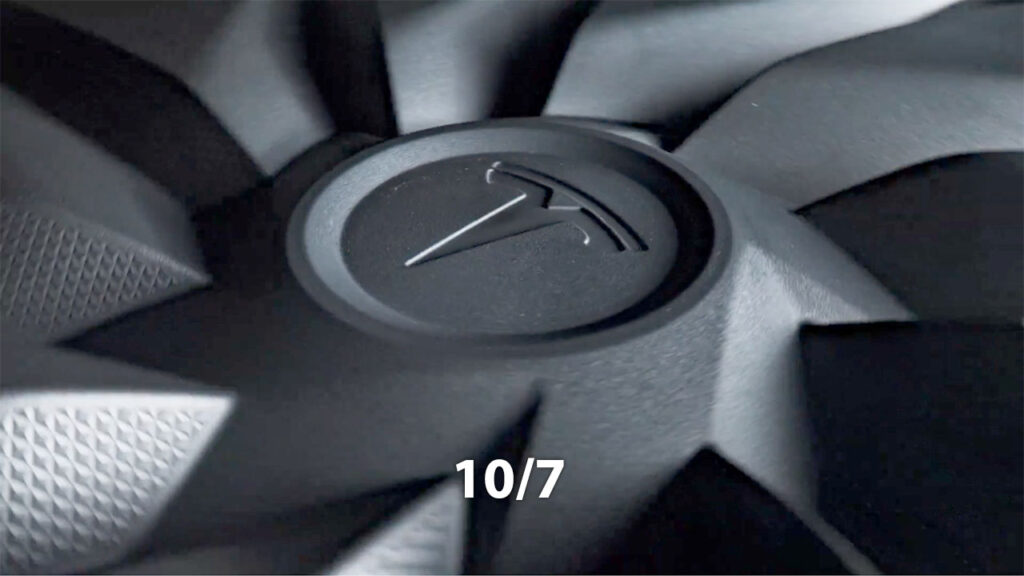 Screenshot from the Tesla 10/7 teaser. Adjusted for more brightness but still does not reveal much.