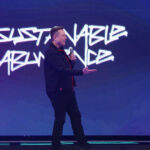 Elon Musk dances at the 2025 Tesla Annual Shareholder Meeting at Giga Texas as he gets the approval of his $1 trillion CEO Performance Award.