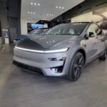 Tesla Model Y Performance in Quicksilver color on display at Tesla's Walnut Creek, CA showroom and store.