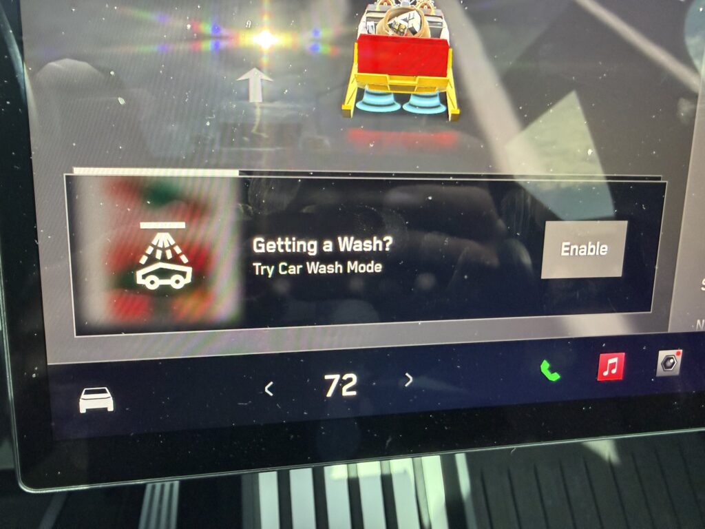 Cybertruck detects as you approach a car wash location and asks the driver to enter the Car Wash Mode.