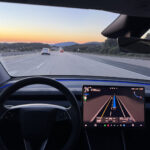 Tesla owner testing FSD v14.2.2.3 (2025.45.8) in a Model Y (Autopilot visualizations visible on the car's center screen).
