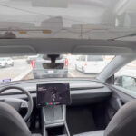 A Tesla Robotaxi passenger shows there is no safety personnel present as the vehicle drives itself in Austin, Texas.