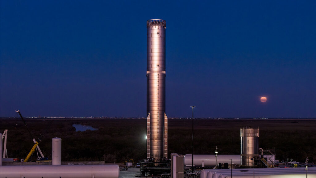 Super Heavy Booster 19 V3 prototype mounted on the thrust simulator stand at the Massey's Outpost at Starbase, Texas for Flight 12 pre-launch testing (picture taking on the evening of 2nd February 2026).