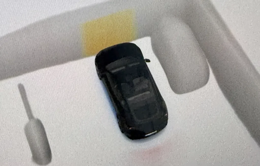 When using Summon after installing the 2026.2.9 update in Europe, an FSD v14-like blue underglow appears under the car's on-screen visualization.