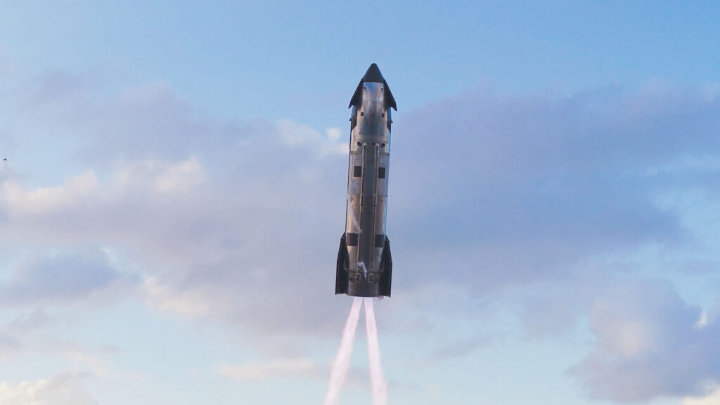 Two Raptor 3 engines firing for a landing burn moments before the Flight 12 Starship (Ship 39) touches the surface of the Indian Ocean for a splashdown landing.