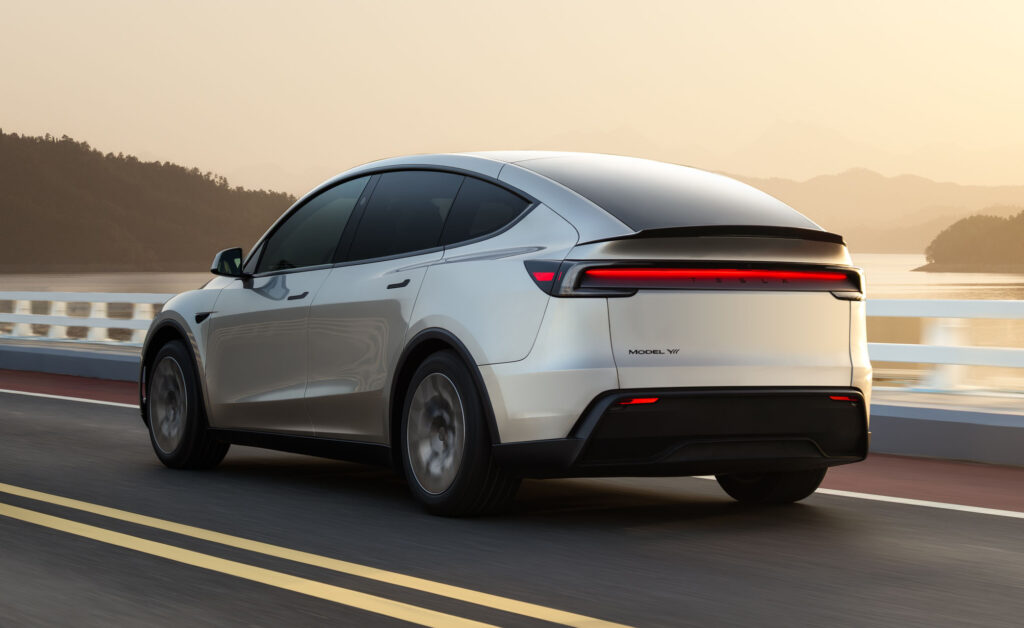 Side profile and Rear Fascia view of a Tesla Model Y L.