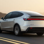 Side profile and Rear Fascia view of a Tesla Model Y L.