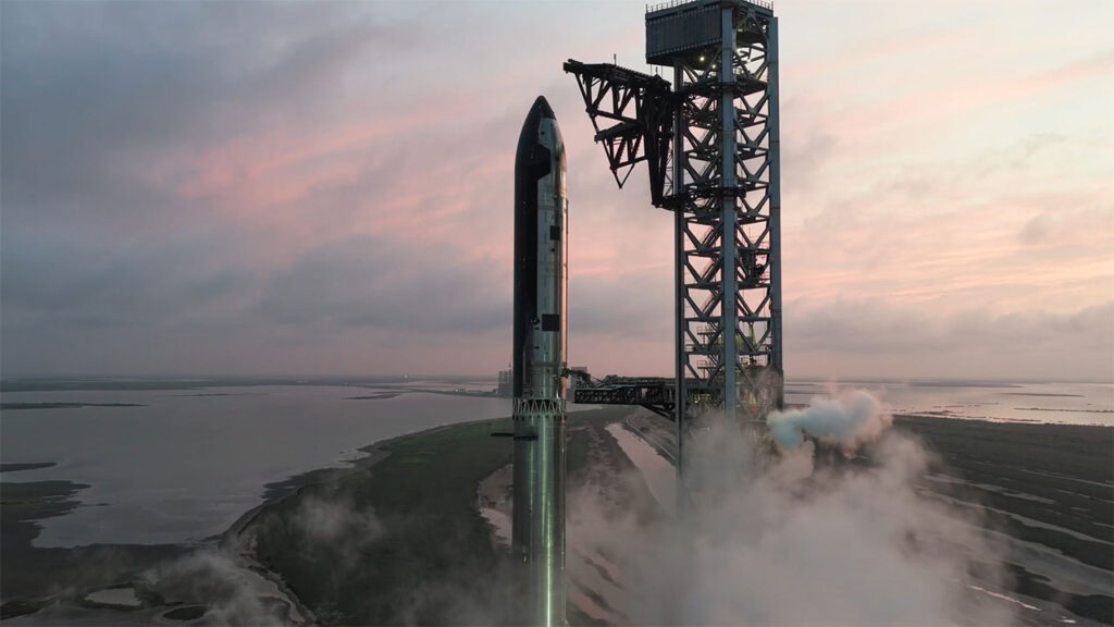 A fully stacked Starship V3 at Starbase Mechazilla launch tower.