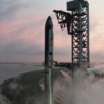 A fully stacked Starship V3 at Starbase Mechazilla launch tower.