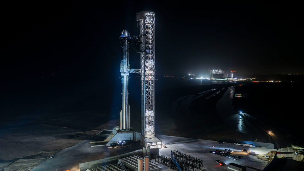 Fully stacked Flight 13 Starship at the Starbase launch tower (Ship 40 mounted on Super Heavy Booster 20; the booster is mounted on the Pad 2 OLM).