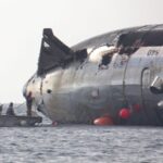 SpaceX engineers and technicians inspecting the Flight 13 Starship (Ship 40) from a boat as it still floats in the Indian Ocean (picture shared by Elon Musk on Friday, August 21, 2026).