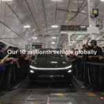 Tesla employees gather to celebrate the company's production of its 10-millionth vehicle (globally), as a Model Y Juniper comes out of the assembly at the Fremont, California factory.