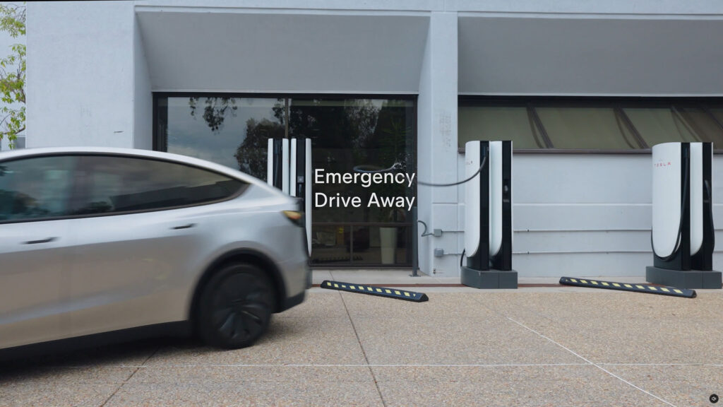 A Tesla Model Y leaves the Supercharger while plugged in using the Emergency Drive Away feature (software update version 2026.38.3 or later, video above).