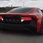 Fan-made concept render of a Tesla Roadster with SpaceX thrusters located behind its license plate.