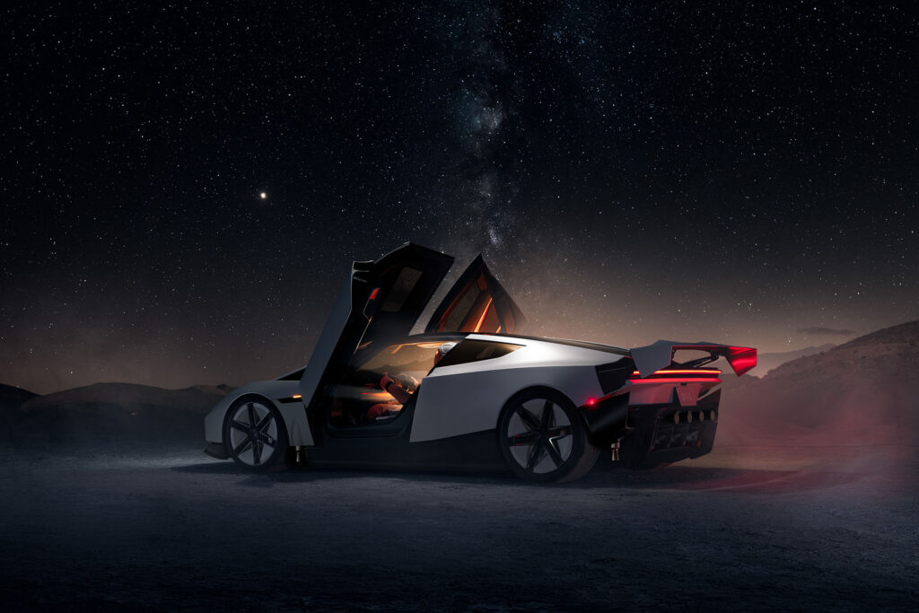 Next-gen Tesla Roadster's side profile view as its scissor doors are open, and spoiler and front fender are activated and retracted (active aerodynamics). The photo is taken at night under a sky full of stars with the title 'Roadster: Out of This World'.