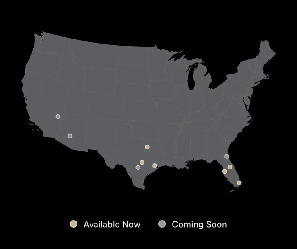 Map of Tesla Robotaxi Service: available cities are marked with orange, and coming soon cities are marked with grey dots (as of October 23, 2026).